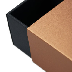 Two-piece small box for souvenirs with a bronze sleeve