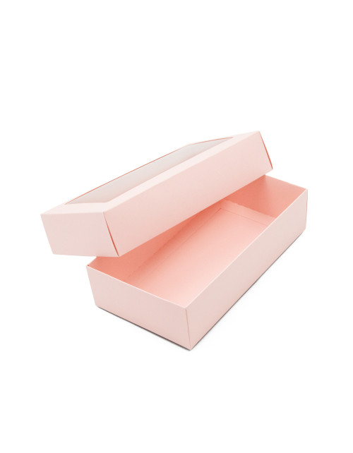 Vaaleanpunainen kaksiosainen pahvinen lahjapaketti, jossa on ikkuna