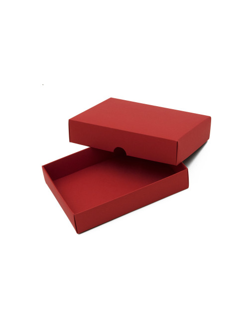 Pieni punainen pahvinen laatikko kannella, lompakon pakkaamiseen