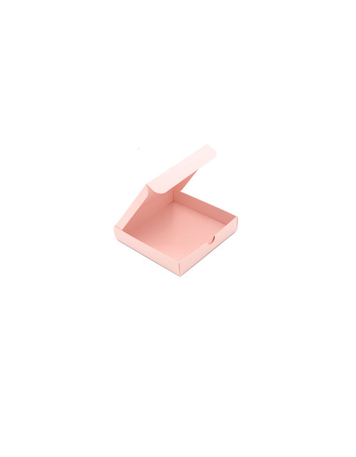Vaaleanpunainen nelikulmainen laatikko, jossa on upotettu pahvikansi